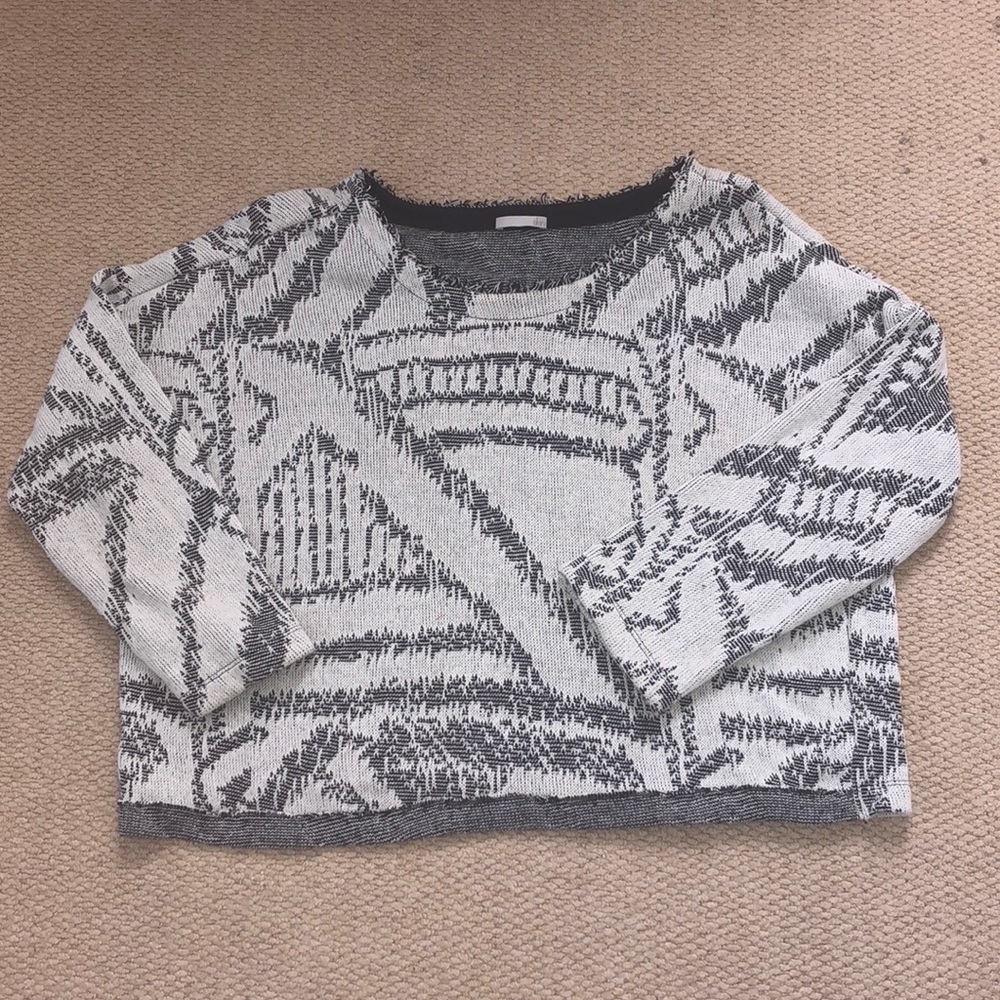 Skin black and cream sweater